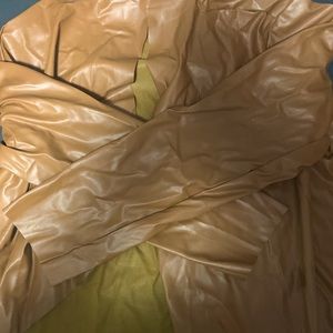 XL tan blazer like wardrobe piece. New original packaging never worn.